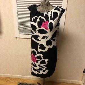 Black dress with bold white and pink flowers